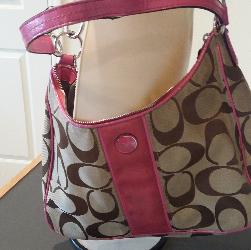 Authentic pink and tan Coach shoulder purse